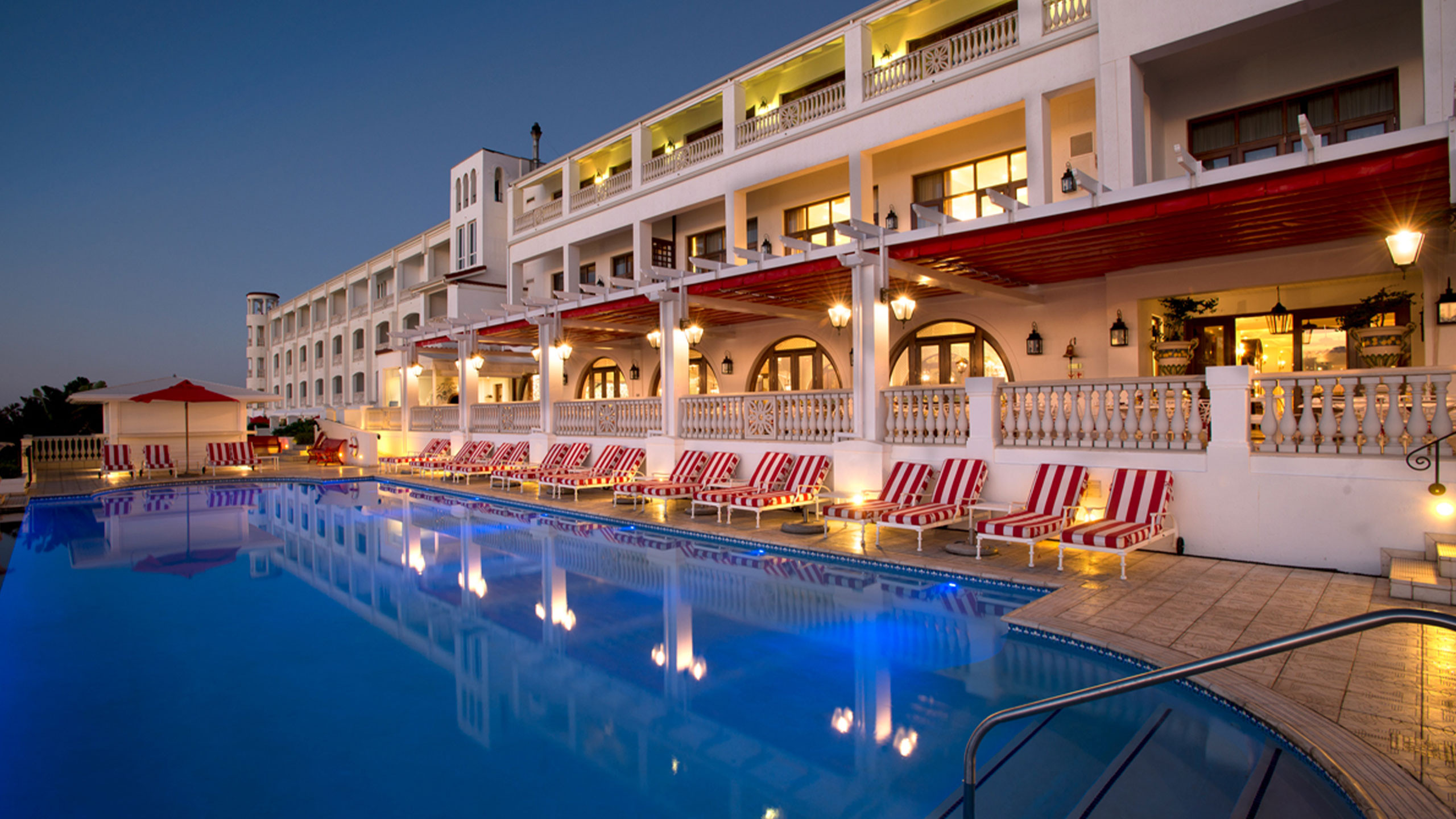 Red carnation hotel poolside view