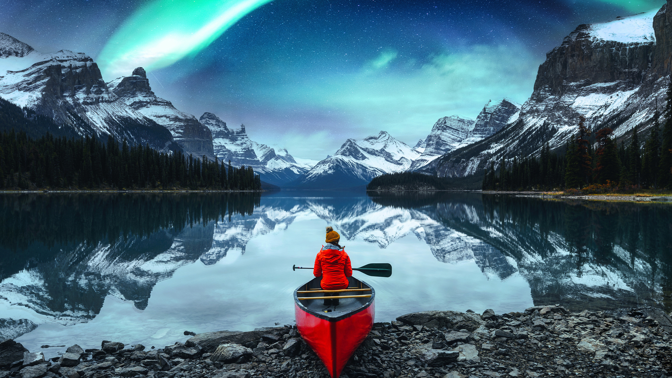 Man in a boat by the sea